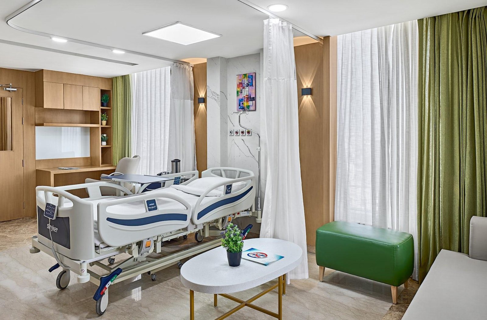 Private patient room with modern hospital bed